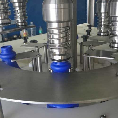 Rotary filling, gravity feed, bottle capping, production line automation