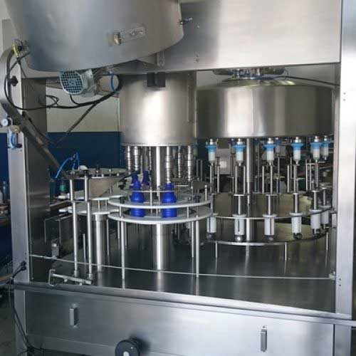 Rotary gravity filler, bottle packaging, liquid solutions, efficient bottling